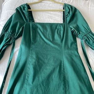 Women’s green Staud dress with puff sleeve and bow tie